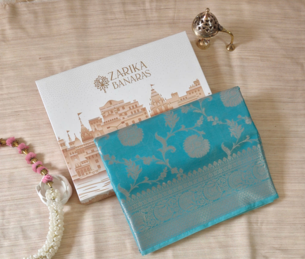 Ice blue Tissue Floral Jaal Saree